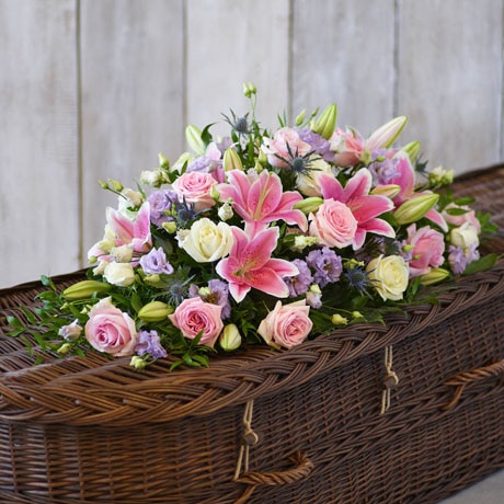 3ft Pink Rose & Eryngium Casket Spray size,  inches height and  inches wide.