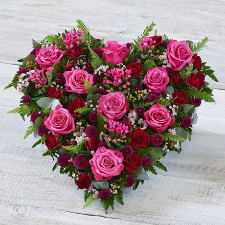 Cerise Rose Heart size,  inches height and  inches wide.