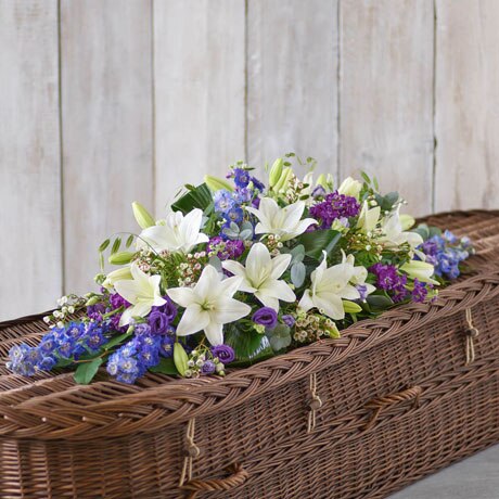 L Blue and White Casket Spray size,  inches height and  inches wide.