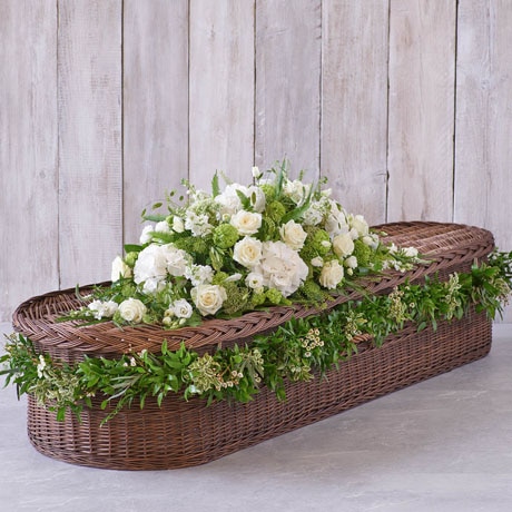 L White Casket Spray with Garland size,  inches height and  inches wide.