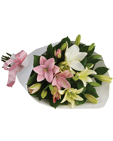 Lovely Lilies Flower Arrangement hand arranged and delivered by a local florist