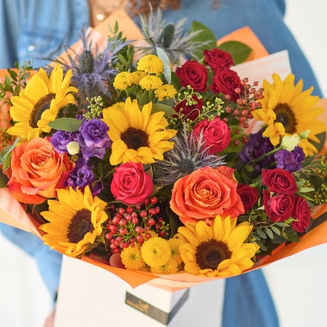 Radiant Sunflower Mix Bouquet size,  inches height and  inches wide.