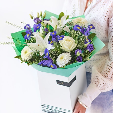 Brilliant Blue and White Bouquet size,  inches height and  inches wide.