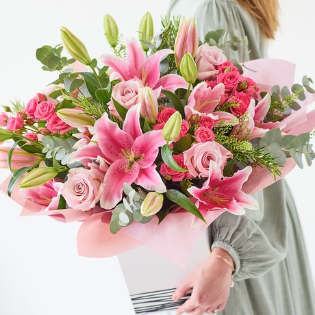 Luxurious Pink Rose and Lily Bouquet size,  inches height and  inches wide.