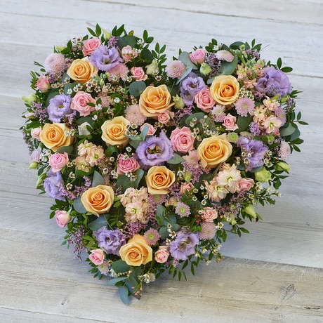 Pastel Rose Heart size,  inches height and  inches wide.