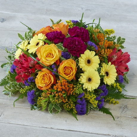 XL Bold Brights Posy size,  inches height and  inches wide.