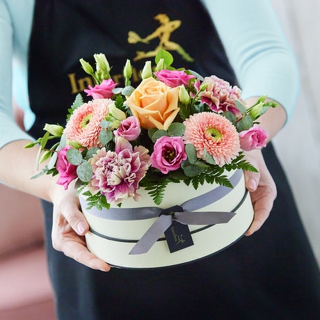 Hatbox made with the finest flowers size,  inches height and  inches wide.