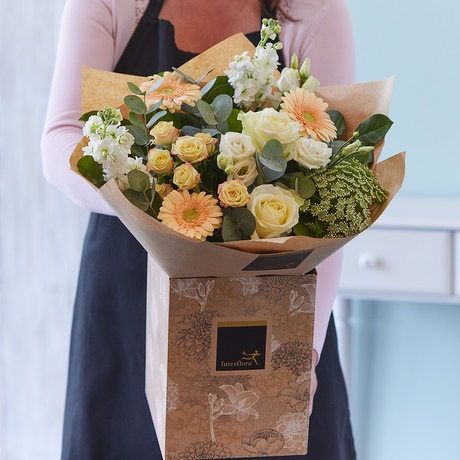 Neutrals Hand-tied bouquet made with the finest flowers size,  inches height and  inches wide.