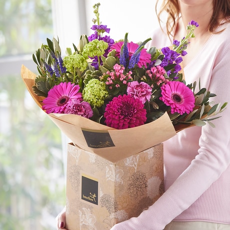 Hand-tied bouquet made with the finest flowers size,  inches height and  inches wide.