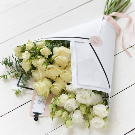 Large White Flower Wrap size,  inches height and  inches wide.