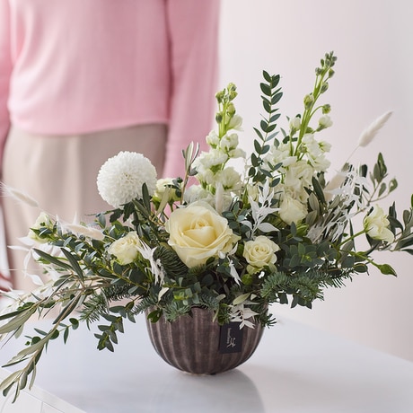Wintery Delights Arrangement size,  inches height and  inches wide.