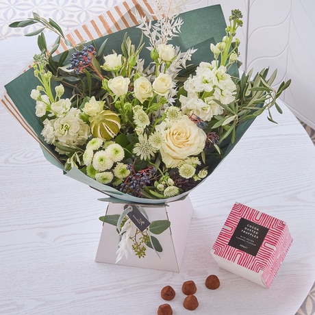 On Trend Winter Bouquet with Chocolates size,  inches height and  inches wide.