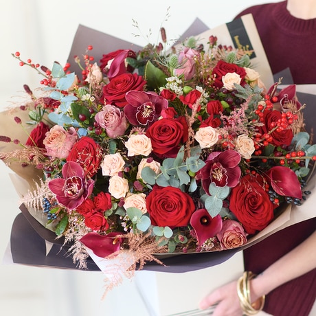The Christmas Showstopper Bouquet size,  inches height and  inches wide.