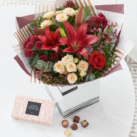 Luxury Classic Christmas Bouquet with Chocolates size,  inches height and  inches wide.