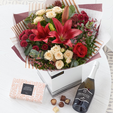 Classic Christmas Bouquet with Chocolates and Fizz Flower Arrangement