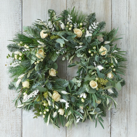 Contemporary Christmas Wreath size,  inches height and  inches wide.