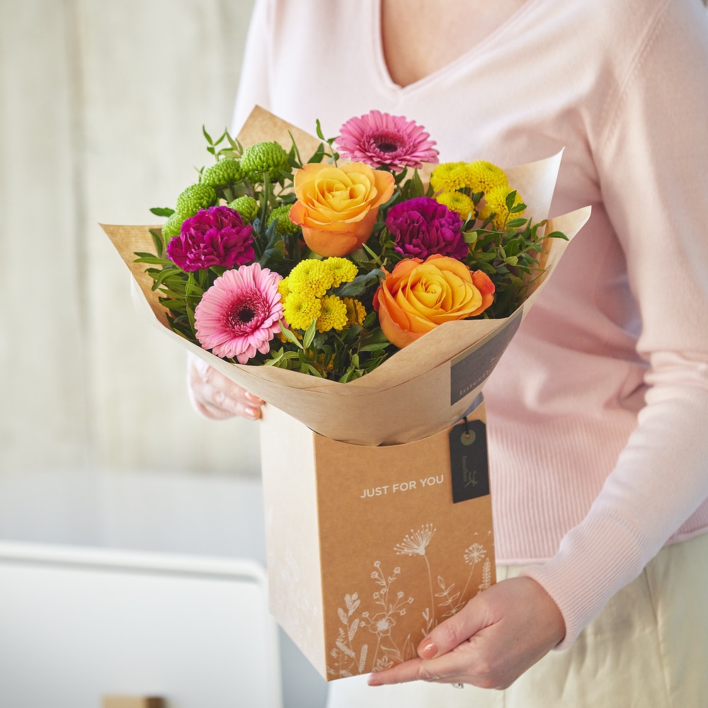 Bright Gift box made with the finest flowers size,  inches height and  inches wide.