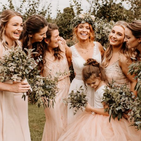 bridal party posing naturally for photograph