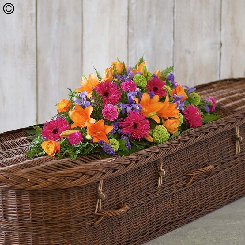 Vibrant Casket Spray size,  inches height and  inches wide.