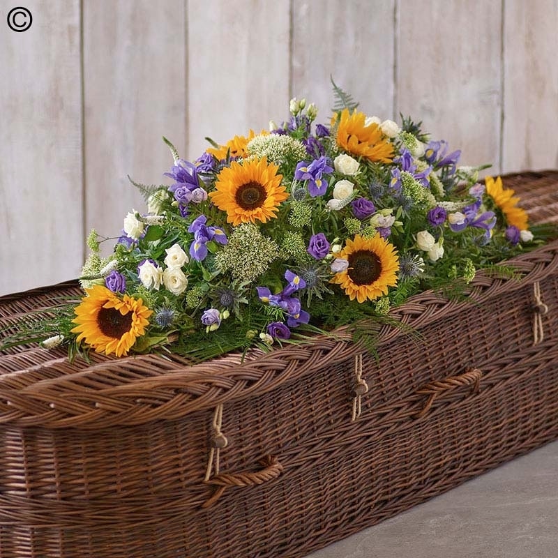 Sunflower Mix Casket Spray size,  inches height and  inches wide.