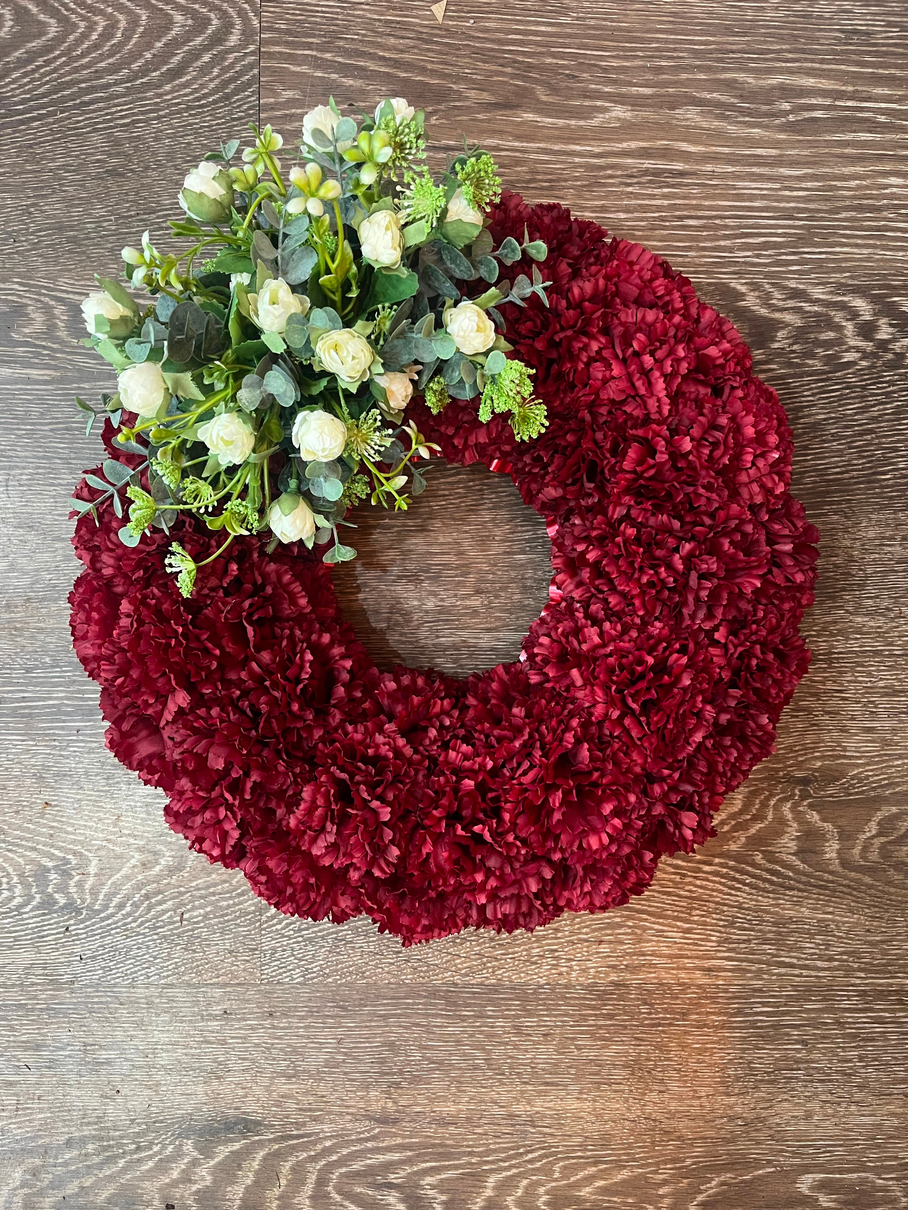 Artificial Floral wreath size,  inches height and  inches wide.