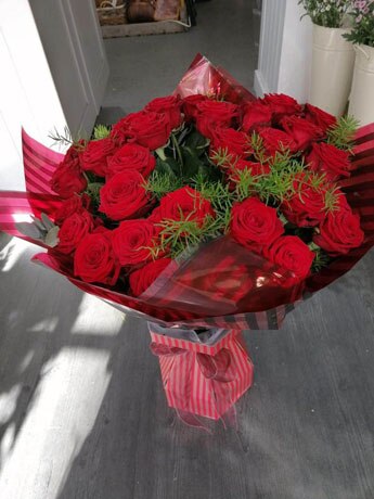 24 Red Roses size,  inches height and  inches wide.