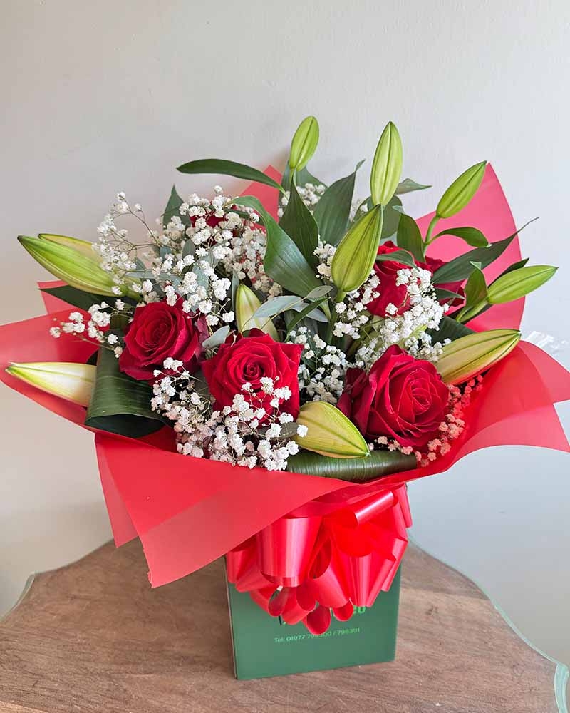 Lady In Red Flower Arrangement