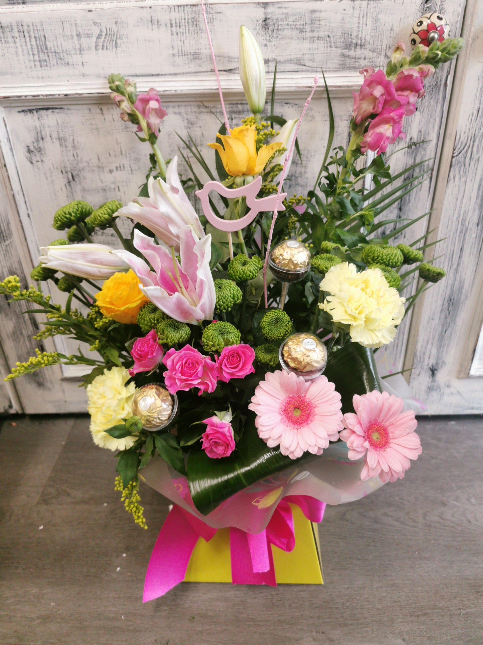 Pink and Yellow Front Facing Box with Ferrero Rocher Flower Arrangement