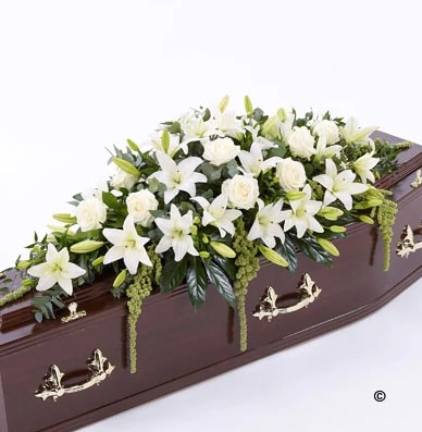 Rose and Lily Casket Spray Funeral Arrangement