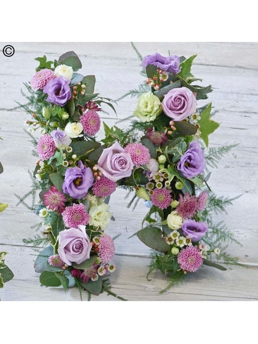 Pink and Lilac Letter Funeral Arrangement