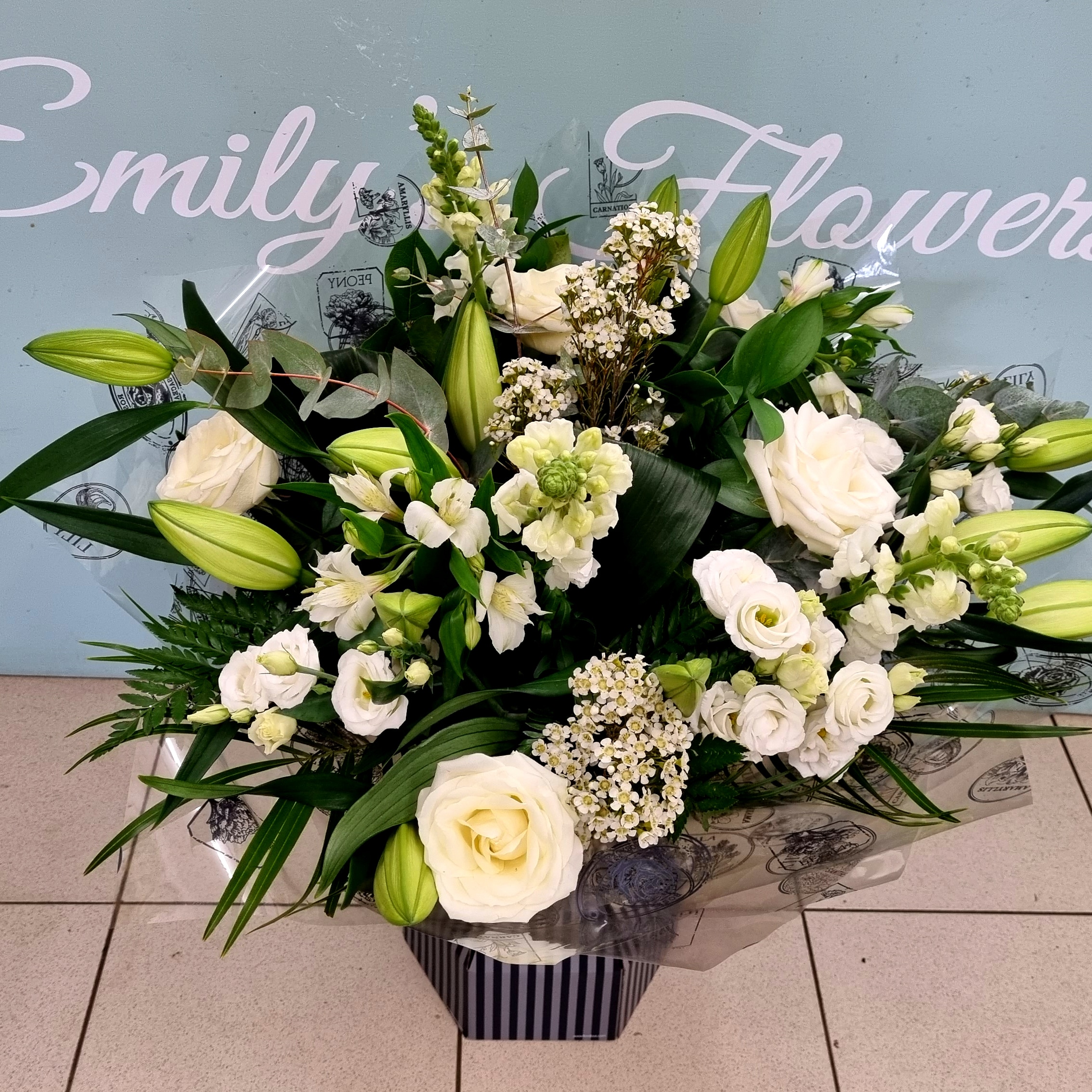 Emily's luxury white handtie Flower Arrangement