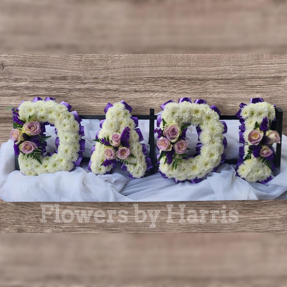 Dadi Tribute Flower Arrangement