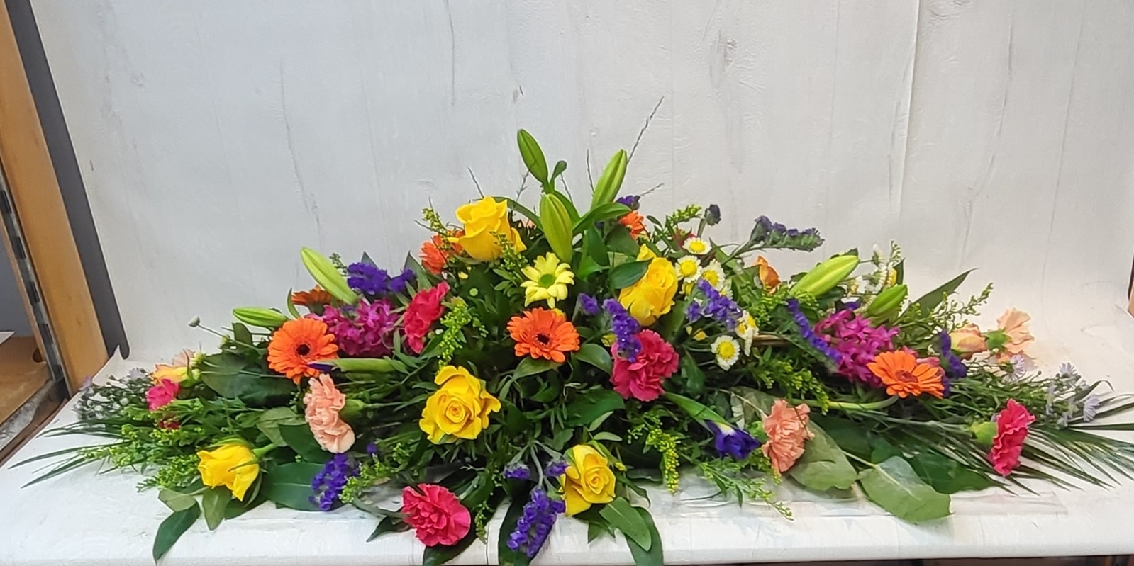 Florist Choice Double Ended Spray Vibrant Funeral Arrangement