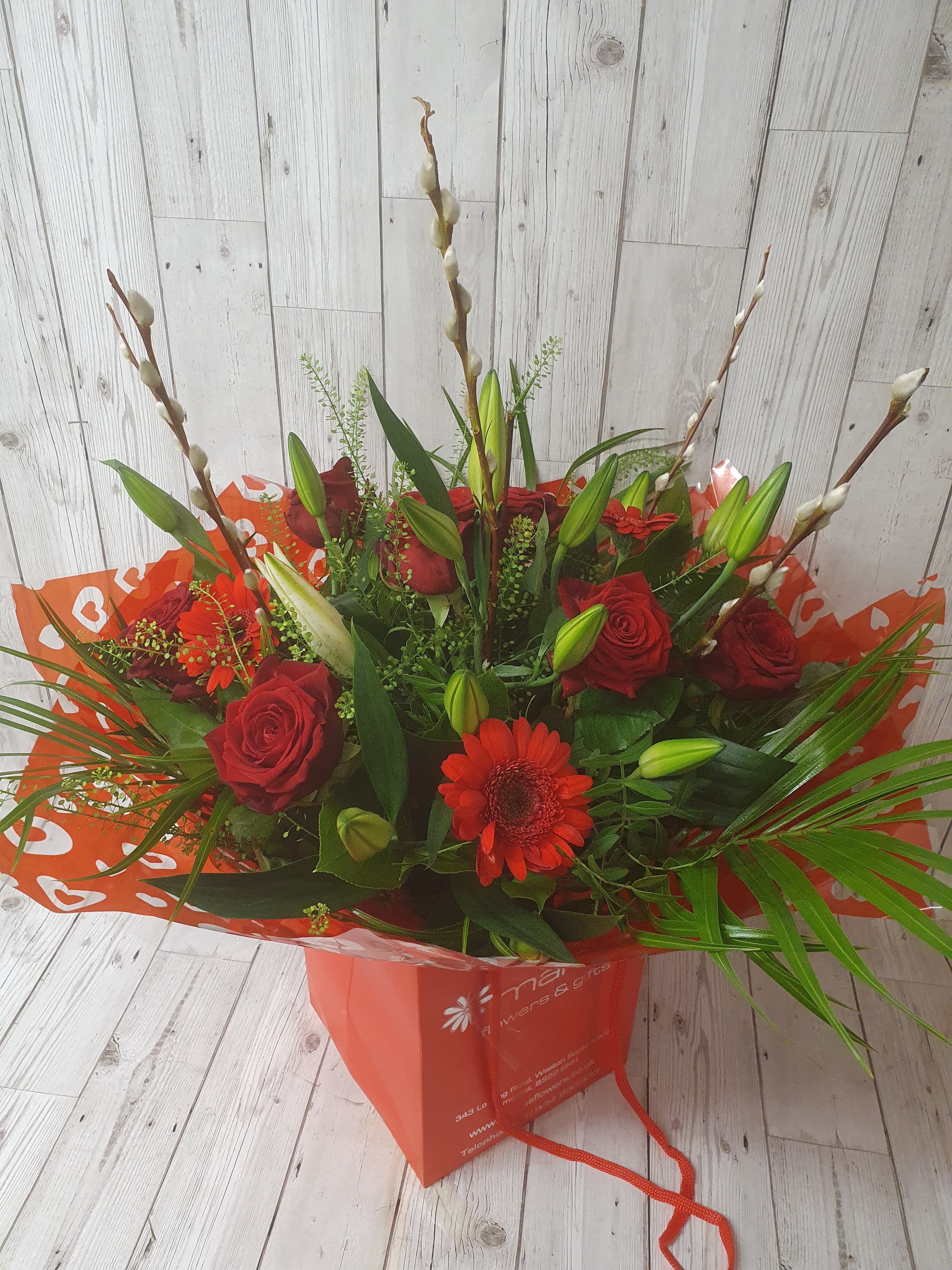 Red Roses, Lillies and Germini Hand-Tied Flower Arrangement
