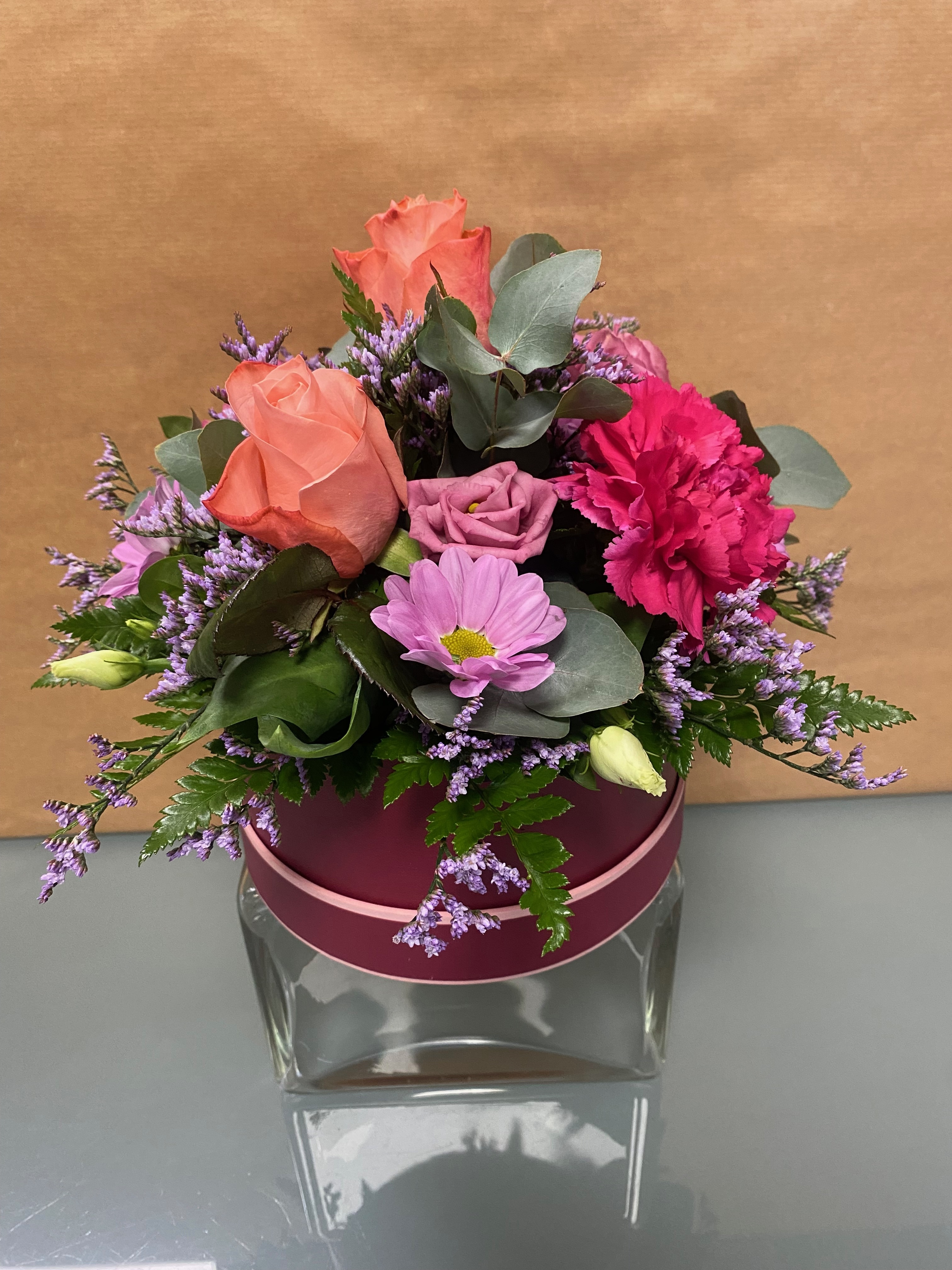 Moores Hat Box in Vibrant Shades Flower Arrangement