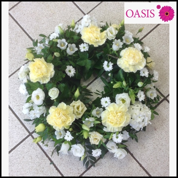 Cream and White Wreath Flower Arrangement