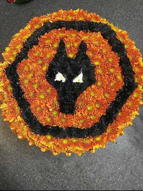 Wolves Tribute Funeral Arrangement